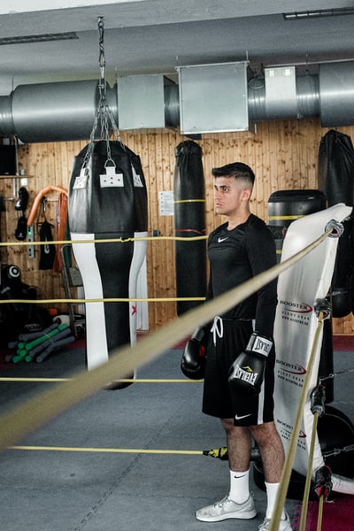 The man standing at the corner ring
